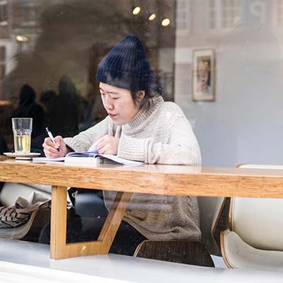 student studying in cafe