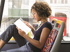 lady studying on bus