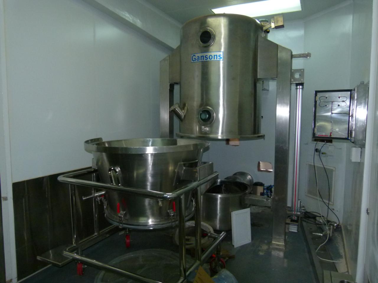 Machine making liquid medicines in Africa image