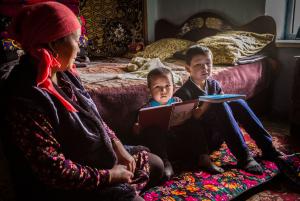 Photo by John Oates of Kyrgyz family at home