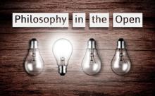 A row of 4 lightbulb, one of which is lit up and turned upside down. Above are the words, 'Philosophy in the Open'.
