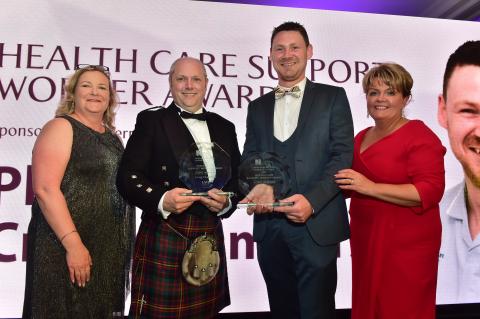 Colette Baker, LV, Craig Chambers and Philip Martin, winners of the Health Care Support Worker Award and Janice Smyth, Director of the RCN in Northern Ireland. 