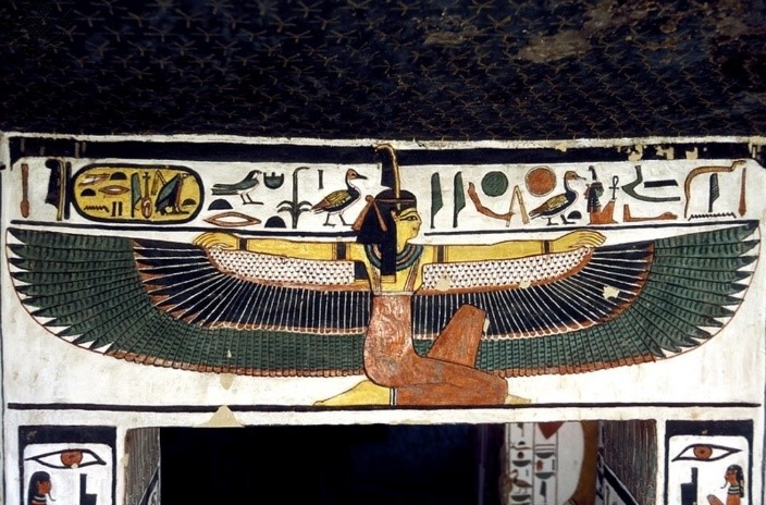 Egyptian painting of the goddess Maat seated with long wings