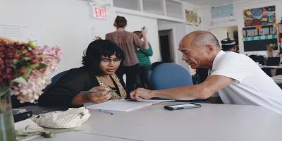 Image of social workers advising client