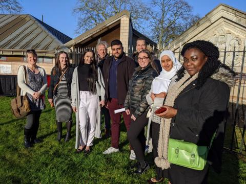 (photo – Roseline ( pictured first on the right), fellow students and tutor Kate Ritchie ( far left) in the HMP High Down grounds, March 2020)