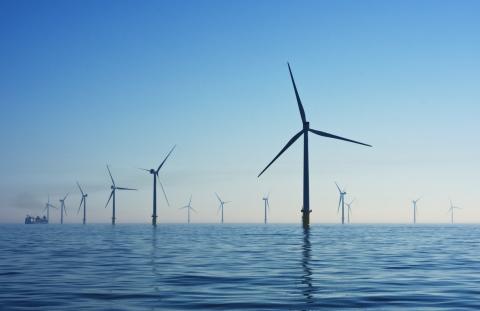 Photo of wind turbines by Jeremy Bishop on Unsplash
