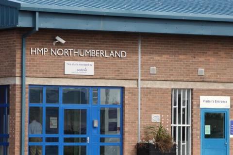 A building with a sign that says 'HMP Northumberland'.