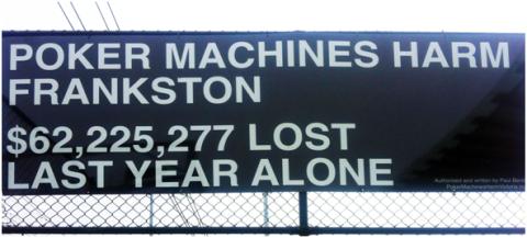 A billboard that says 'Poker machines harm Frankson. $62,225,277 lost last year alone.'