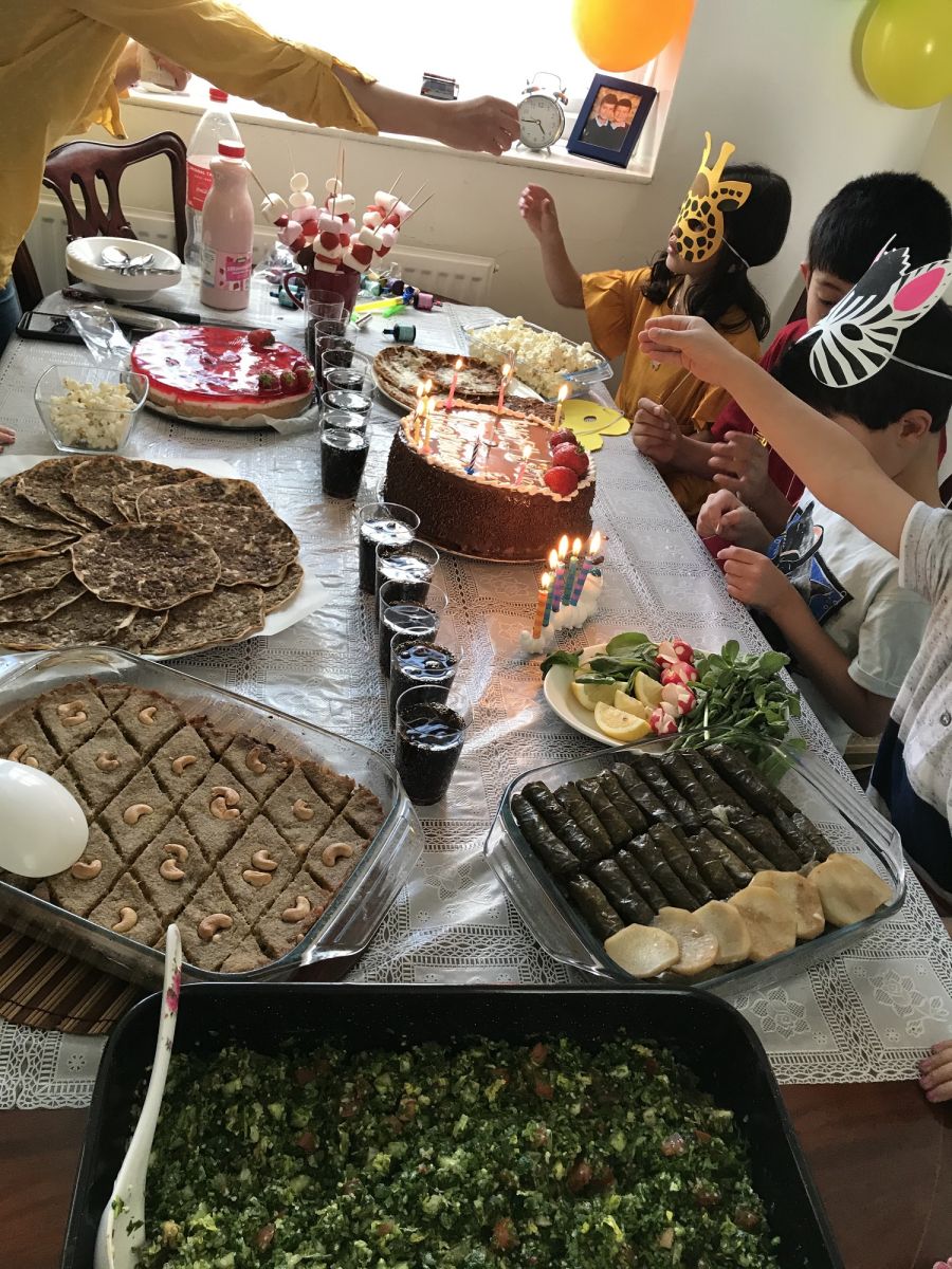 A table filled with delicious-looking foods is prepared