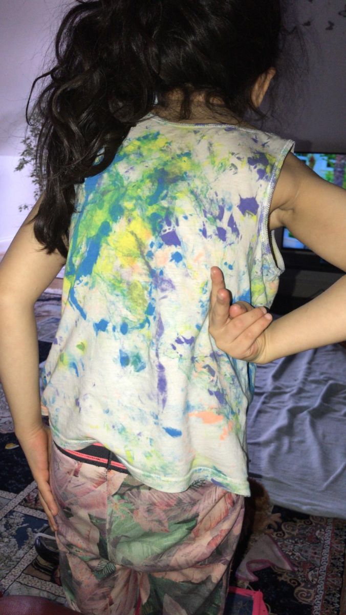 back of a painted t-shirt, wore by a girl