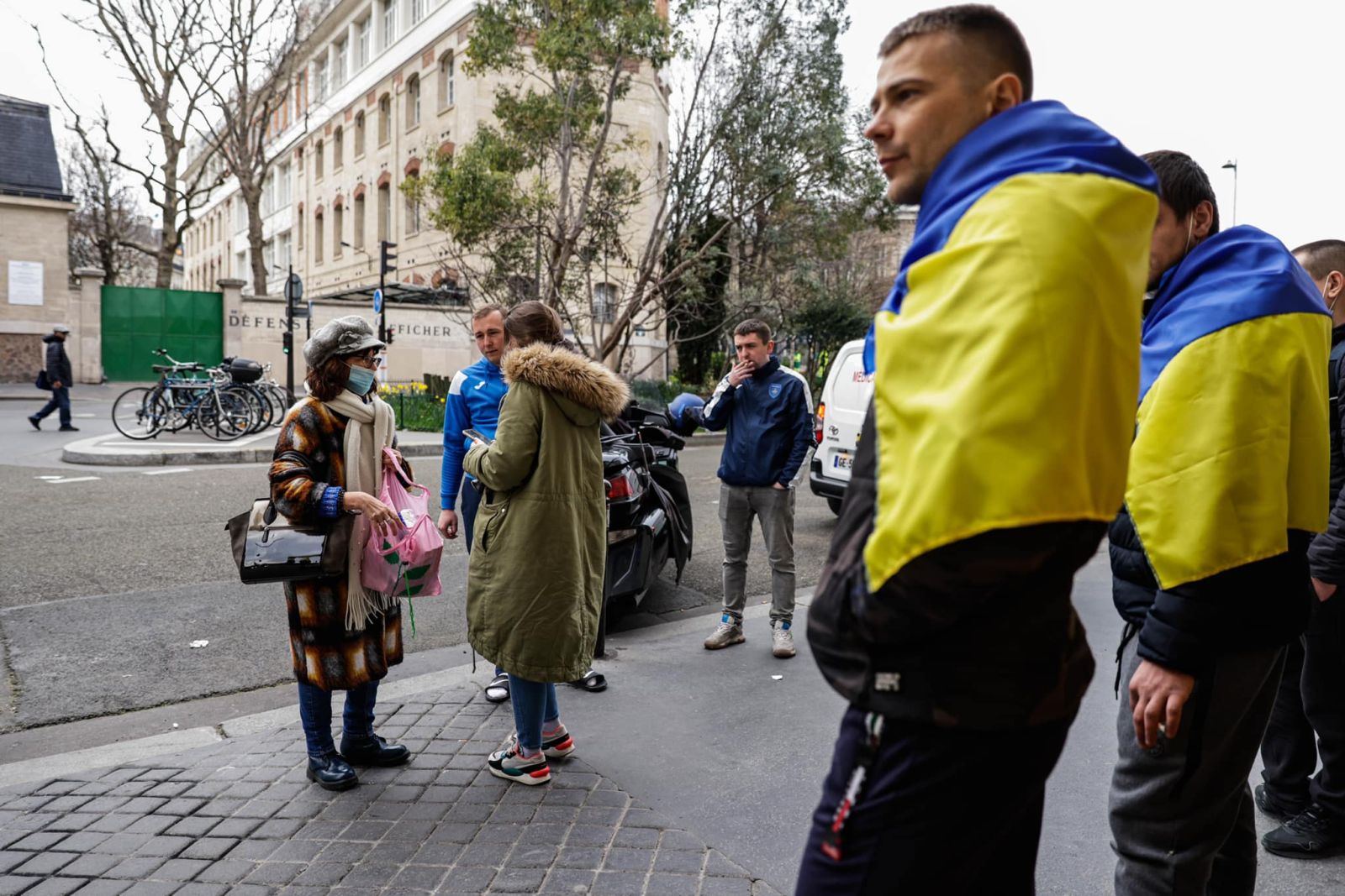 Volunteers organise goods as part of an initiative of football team FC Hoverla Paris