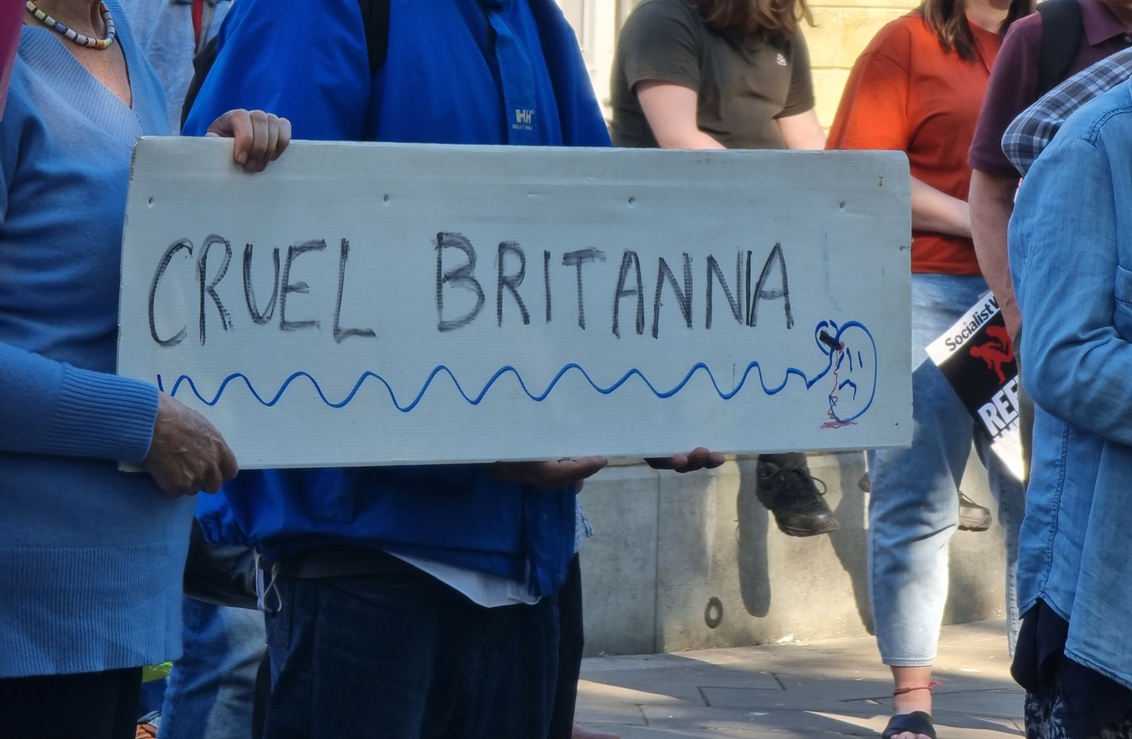 placard saying 'Cruel Britinnair'