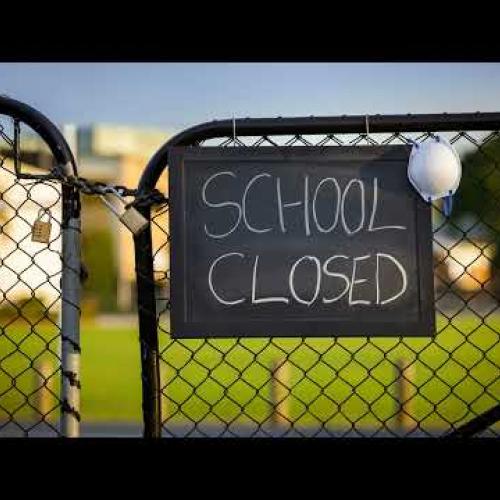 School gate with sign "school closed"