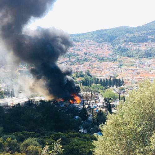 black smoke from Fire at Samos Camp