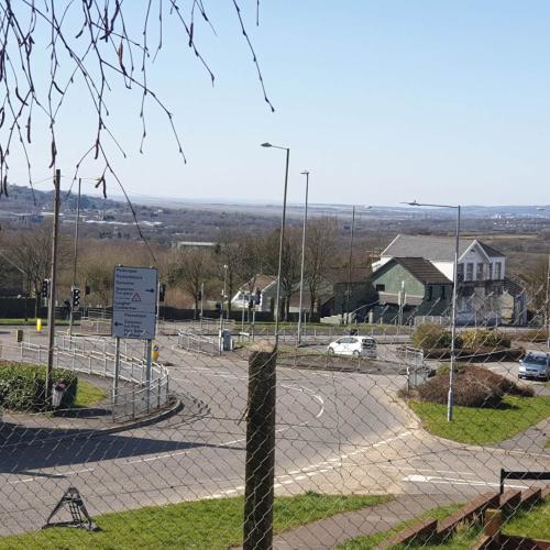 asylum seeker's view from a fenced window