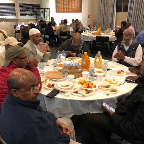 Members of the Eritrean community coming together during Ramadan in Melbourne, Australia, to break fast