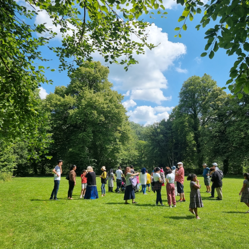 Refugees and volunteers in Craig-y-Nos park in Brecon Beacons