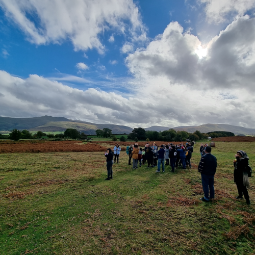 A group of people standing in Brecon Beacons