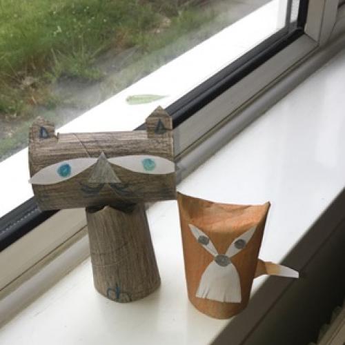 Two pets made of cardboard from toilet rolls.