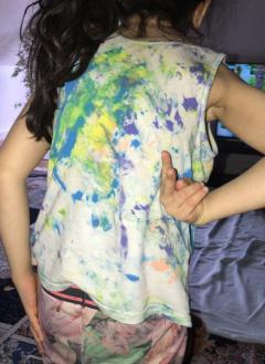 colour-painted t-shirt on the back of a girl