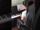 Girl playing piano