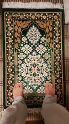 Image of feet of prayer mat