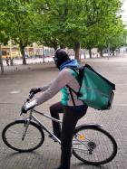 migrate student deliverooing on bike in Netherlands