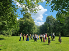 Refugees and volunteers in Craig-y-Nos park in Brecon Beacons