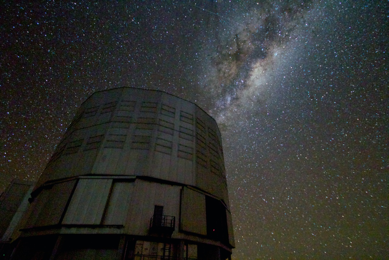 The Very Large Telescope under the Milky Way. In this picture, comet 67P is under the bulge of the milky way and to the upper right of the telescope, but is approximately one million times dimmer than the faintest stars in this image.