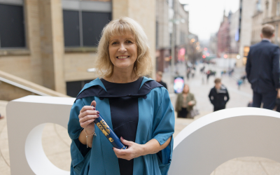 OU graduate Gina attended a degree ceremony in Glasgow. Photo by Kathryn Tuckerman.