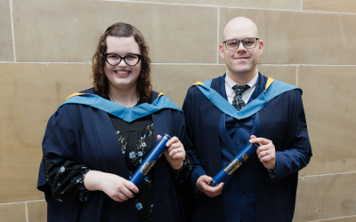 OU graduates and married couple Vicki and David attended a degree ceremony together in Glasgow. Photo by Kathryn Tuckerman.