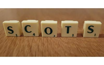 Scrabble pieces, spelling out Scots
