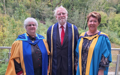 Honorary graduates Norena Shopland and Tracy Pike with presiding officer Nick Braithwaite